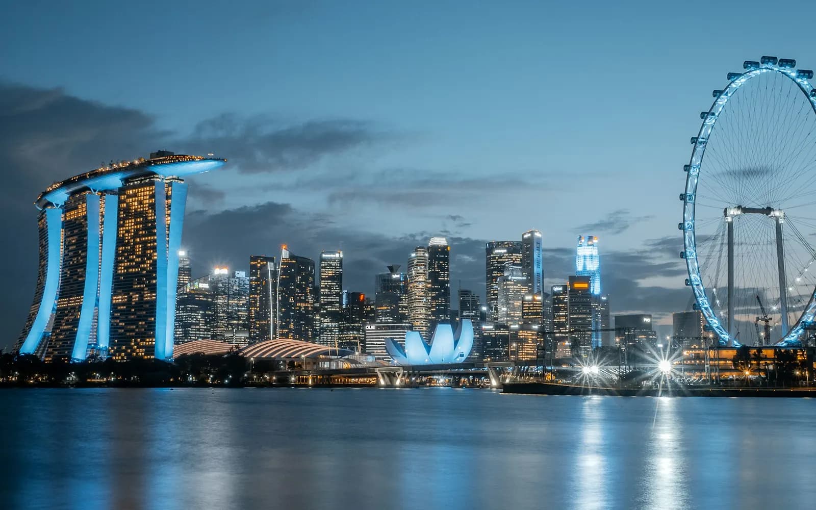 The Singapore skyline over Marina Bay at dusk