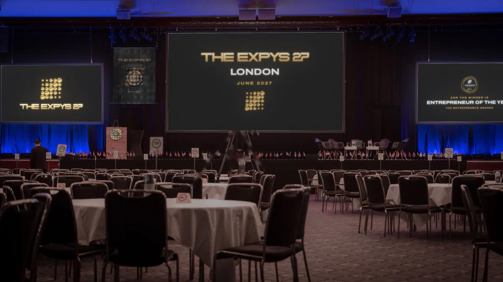 A ballroom set for dinner, THE EXPYS 27 and London on the big screen