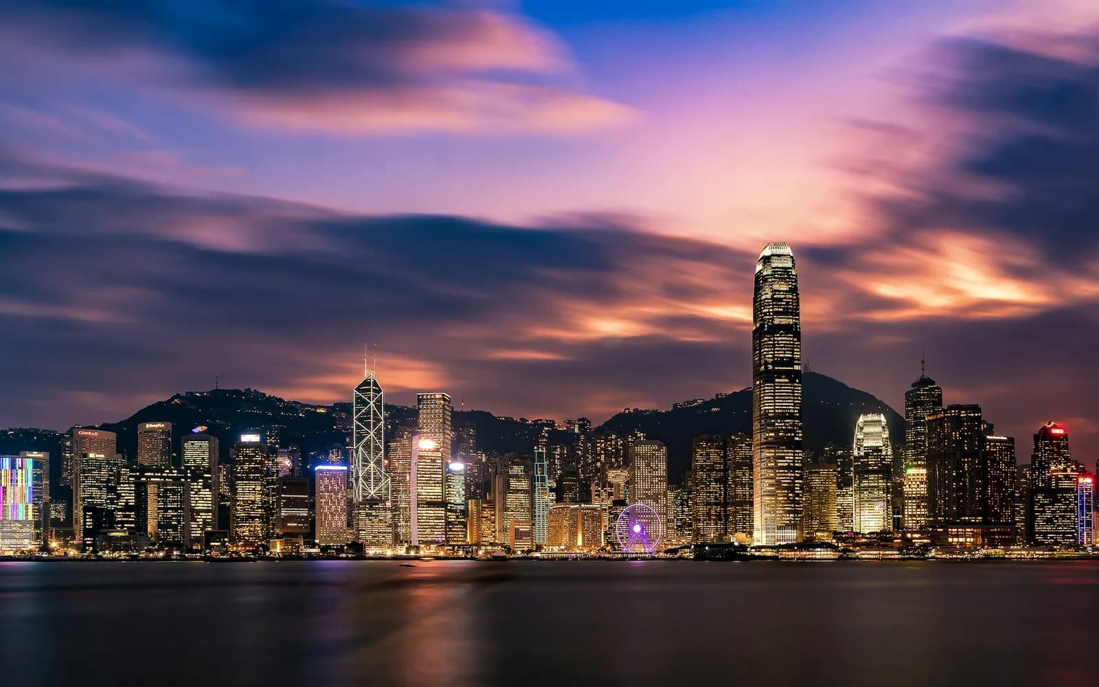 Victoria Harbour and the Hong Kong skyline at night
